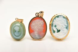 THREE AGATE CAMEOS, the first an oval form pendant, collet set in yellow gold, approximate length