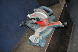 A BOSCH PROFESSIONAL GCM10S SLIDING COMPOUND MITRE SAW with a 254mm blade (PAT pass and working