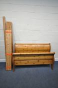 A MODERN PINE 5FT SLEIGH BED, with side rails, slats, central support and bolts, condition report: