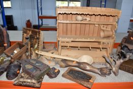 A COLLECTION OF LARGE DECORATIVE TREEN to include two folding triptychs in a folk style, a wooden