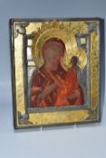 A LARGE ORTHODOX 'HODEGETRIA' ICON with an open removable oklad decorated in contrasting plated