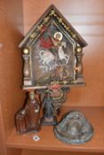 FOUR CARVED RELIGIOUS SCULPTURES to include a large carved image of St George killing the dragon