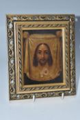 AN ORTHODOX 'MANDYLION' ICON oil on wood panel, nineteenth century Russian school, depicting the