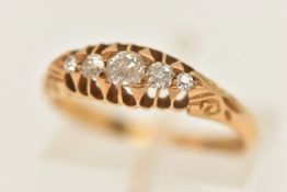 AN EARLY 20TH CENTURY 18CT GOLD BOAT RING, set with a row of five graduated old cut diamonds, to the