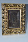 A CARVED 'ST NIL STOLOBENSKY' ICON with a carved figure of St Nil Stolobensky modelled on a famous