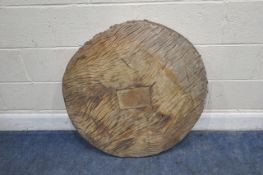 AN ANTIQUE WOODEN WHEEL, with a central rectangular block and slot, diameter 80cm, condition report: