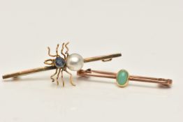 TWO BROOCHES, the first a yellow metal bar brooch attached with a spider set with a blue sapphire