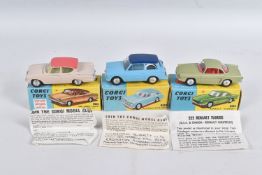 THREE BOXED CORGI TOYS DIECAST MODELS, the first a Austin A.40 Saloon, no. 216, two tone blue body