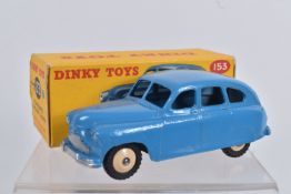 A BOXED DINKY TOYS DIECAST STANDARD VANGUARD MODEL, no. 153, mid blue body, fawn wheel hubs,