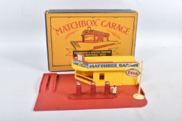 A BOXED MATCHBOX SHOWROOM AND SERVICE STATION ACCESSORY PACK, No.MG1, 'Matchbox Garage, red base and