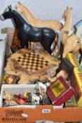 A BOX OF TOYS AND GAMES, to include a live edge chessboard containing a full set of small cast metal