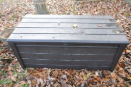 A KETER PLASTIC GARDEN STORAGE BOX, with lid width 144cm, depth 69cm, height 60cm. Condition Report;