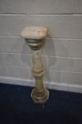 AN ALABASTER CYLINDRICAL PLANT STAND, height 99cm, condition report: top comes off, ideal for a