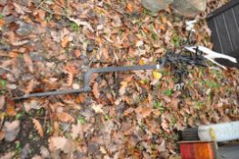 A 20th CENTURY WROUGHT IRON WEATHER VANE with a painted aluminium horse figure pediment and a