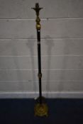 A SLENDER BRASS AND EBONISED FLOOR LAMP, with a female bust, on a reeded pillar, raised on a foliate