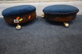 A PAIR OF 19TH CENTURY BURR WALNUT CIRCULAR FOOTSTOOLS, with blue fabric upholstery, raised on three