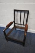 A 19TH CENTURY ROSEWOOD BOBBIN TURNED ARMCHAIR, with open armrests, raised on brass caps and