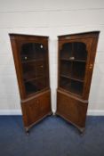 A BURR WALNUT CORNER CUPBOARD, fitted with a glazed door and cupboard door, raised on front cabriole