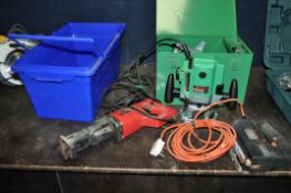 A HITACHI M8V 1/4in ROUTER in metal case, a Power Devil reciprocating saw and a Black and Decker