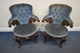 A PAIR OF VICTORIAN MAHOGANY ARMCHAIRS, with blue fabric upholstery, scrolled armrests, raised on