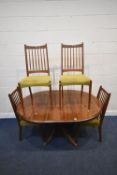 A MODERN PINE EXTENDING DINING TABLE, raised on a single pedestal with four legs, length 152cm x