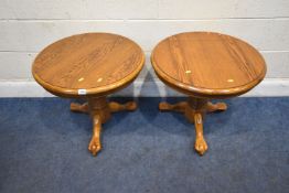 A PAIR OF MODERN OAK CIRCULAR TABLES, raised on a single pedestal with three legs, diameter 61cm x