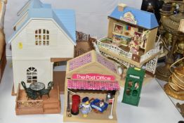 A GROUP OF SYLVANIAN FAMILIES PLAY SETS, comprising Courtyard Restaurant, Sylvanian Toy Shop, Post