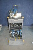 A RYOBI TOOLSTATION with chop saw, circular saw, light, reciprocating saw and drill (not working)
