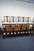 A MODERN HUANGHUALI ORIENTAL STYLE EXTENDING DINING TABLE, with three additional leaves, the pierced