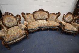 A REPRODUCTION ITALIAN THREE PIECE LOUNGE SUITE, comprising a three seater sofa, with scrolled and