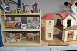 TWO SYLVANIAN FAMILIES HOUSES AND ACCESSORIES, to include Red Roof Country Home, with some furniture