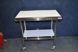 A VEVOR STAINLESS STEEL WORKSHOP TROLLEY with undershelf (was new and still packaged we assembled