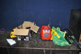 TWO POLTI STEAM CLEANERS including a Vaporetto 2400 with some accessories and a Vaporetto Pocket