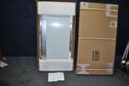 A NEW AND BOXED STAINLESS STEEL WHEELED WORK TABLE top width 120cm, depth 60cm (unknown height) (box