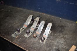 FOUR STANLEY WOOD PLANES comprising of a No.7, a No.5, a No.4 and a No.3