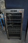 A FISHER & PAYKEL RF206RDWX1 WINE COOLER with one glazed door, width 59cm, depth 64cm, height