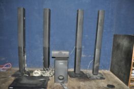 A SAMSUNG HT-Z215 HOME THEATRE SYSTEM with four floor standing speakers (not bolted together), a