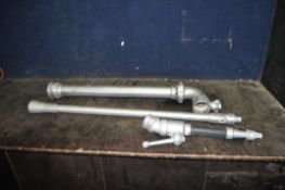 A MODERN FIREMAN'S HOSE NOZZLE, a stand pipe and a standpipe socket (3)
