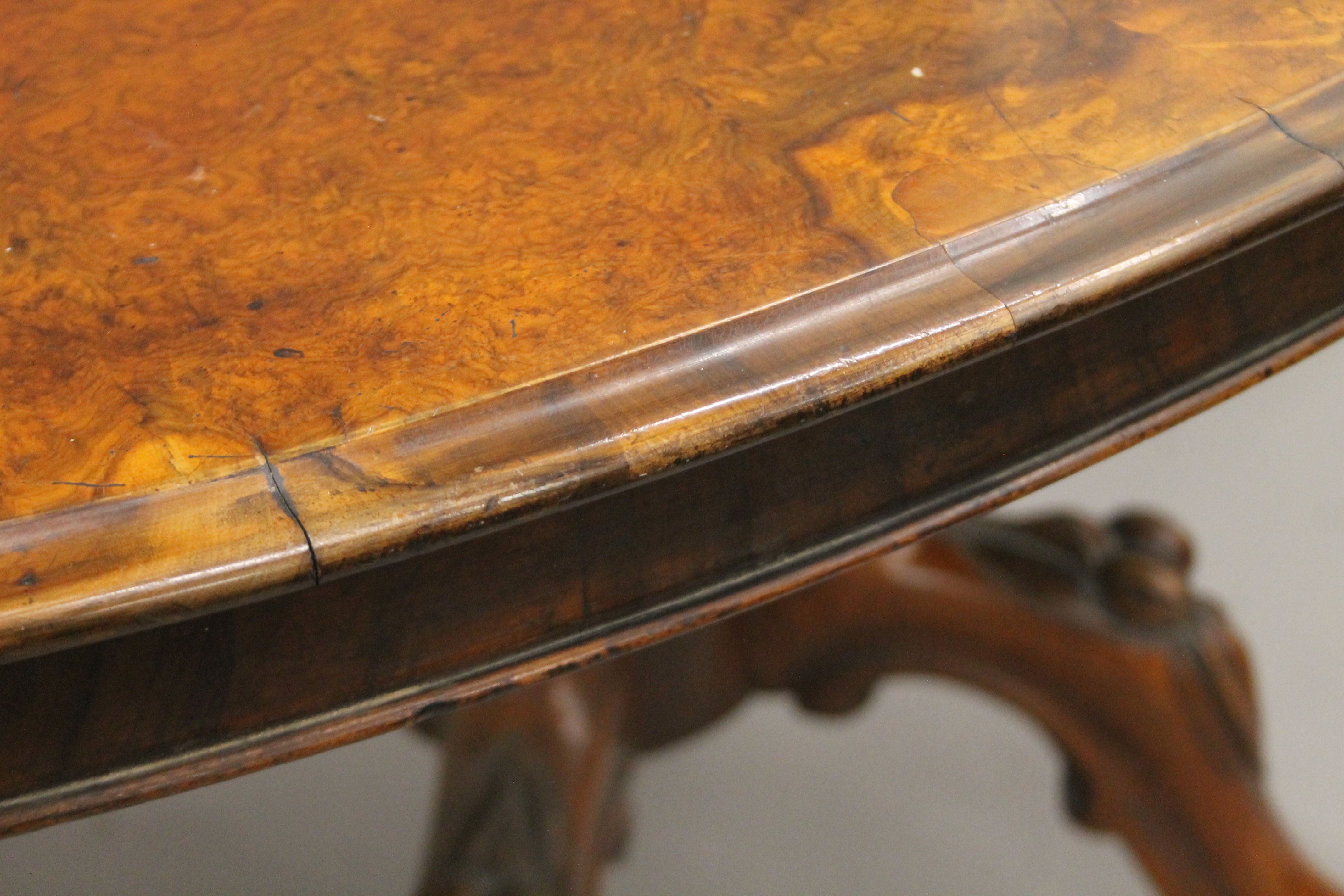 A Victorian burr walnut loo table. 135 cm long. - Image 3 of 6
