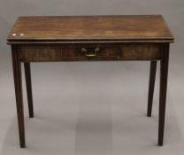 A 19th century mahogany tea table. 96 cm wide.
