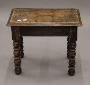 An oak joint stool. 47.5 cm long.