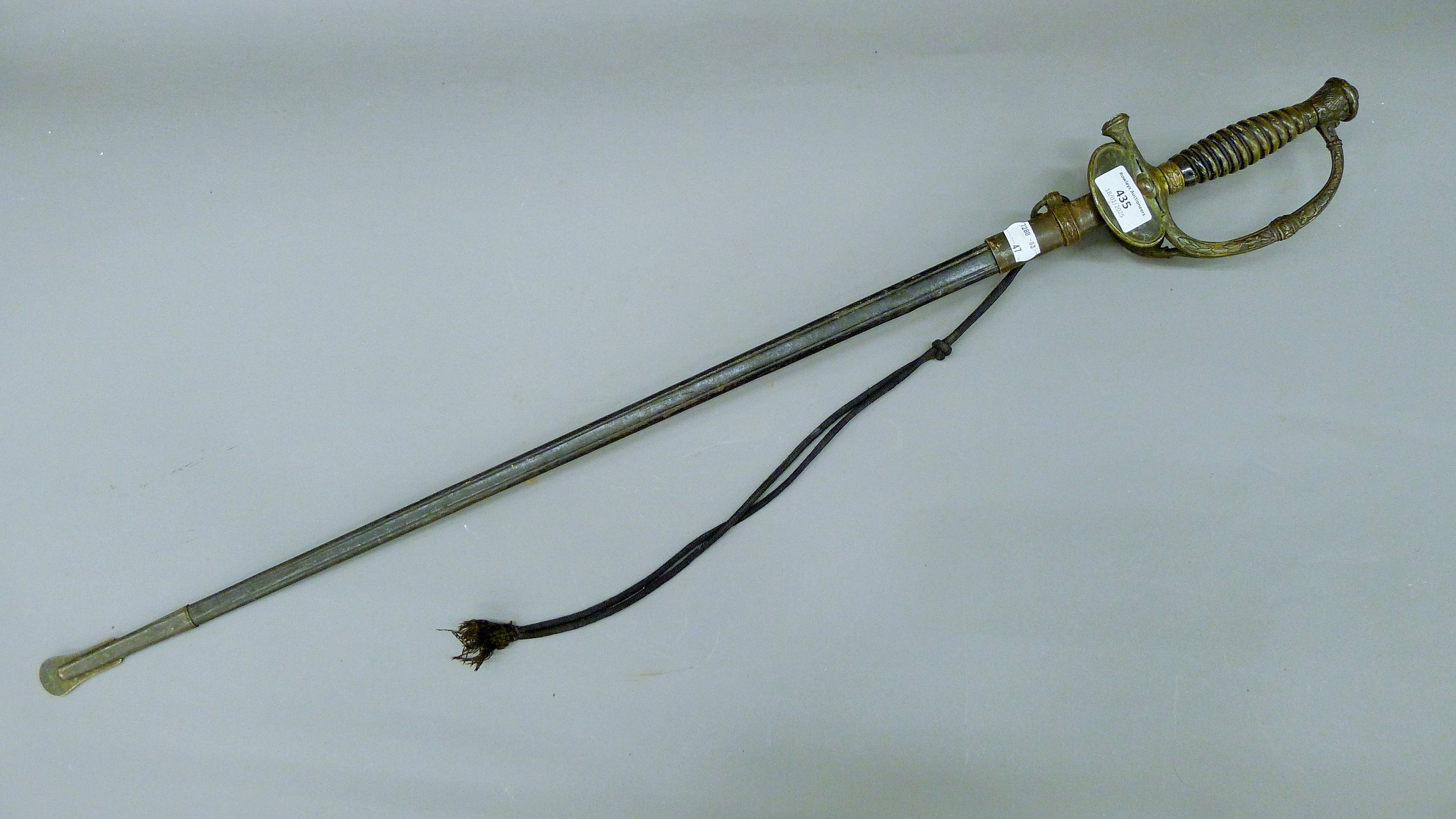 A 19th century French Naval officer's sword in scabbard. 94 cm long.