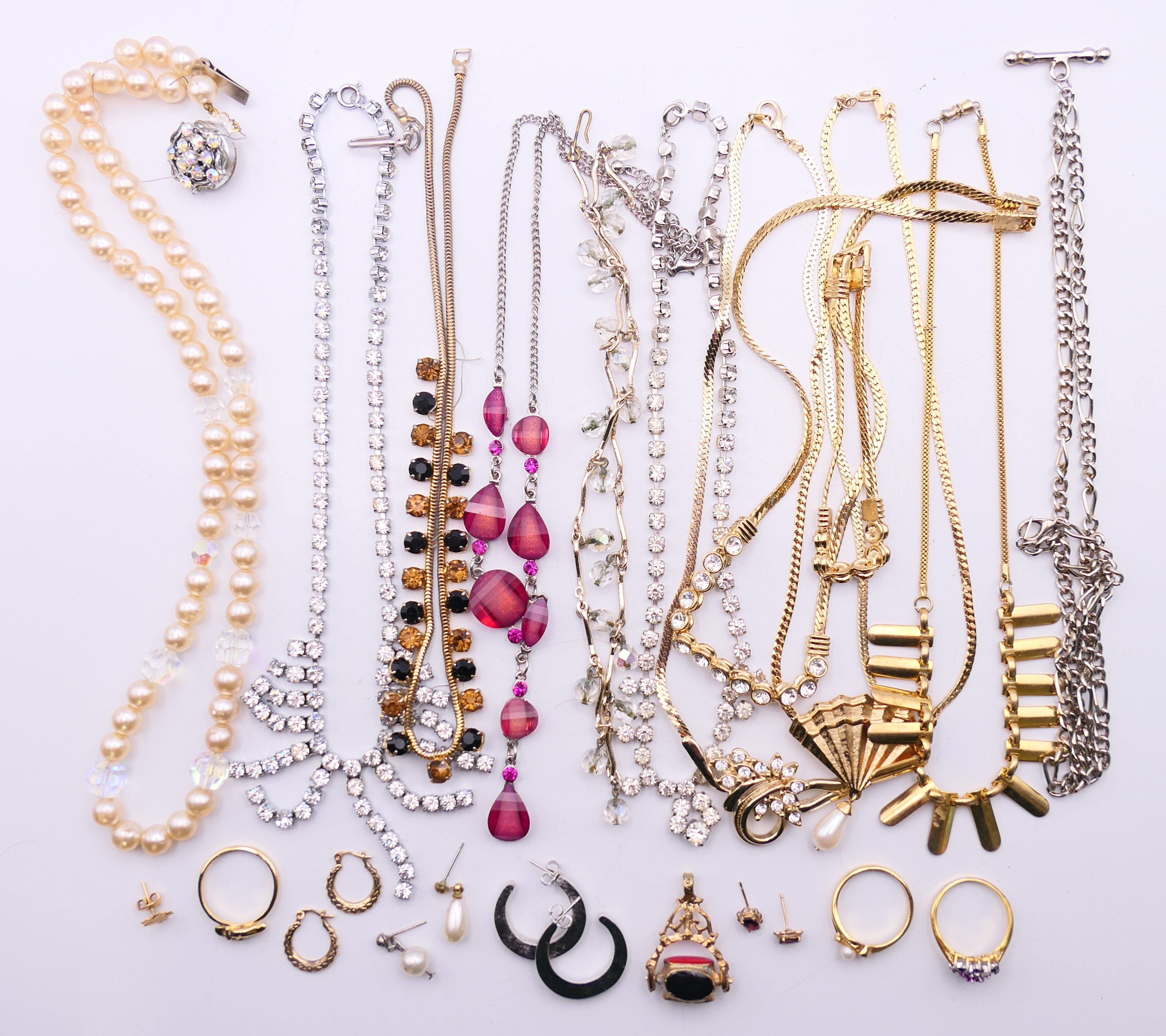 A quantity of various costume jewellery, to include a pair of 9 ct gold earrings 0.