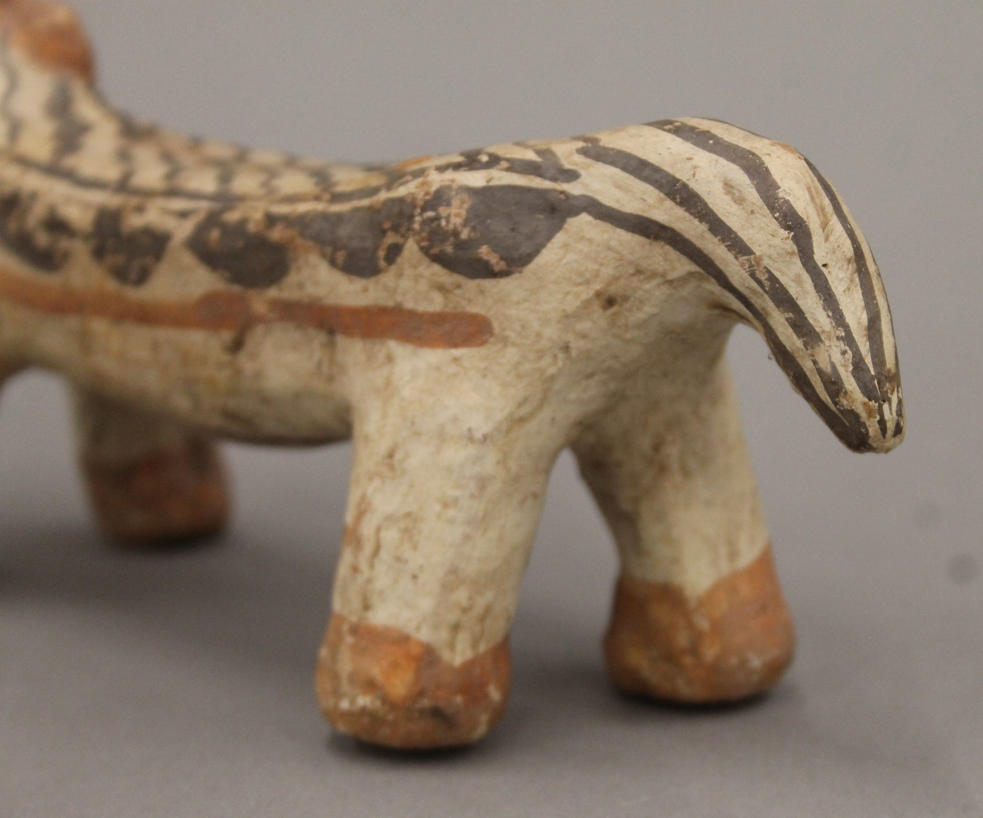 An antique Greco-Romano terracotta painted anamorphic model. 24 cm long. - Image 4 of 5