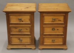 A pair of modern pine bedside drawers. Each 51.5 cm wide.