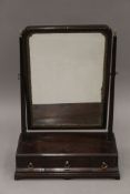 A George III mahogany dressing table mirror. 43.5 cm wide.