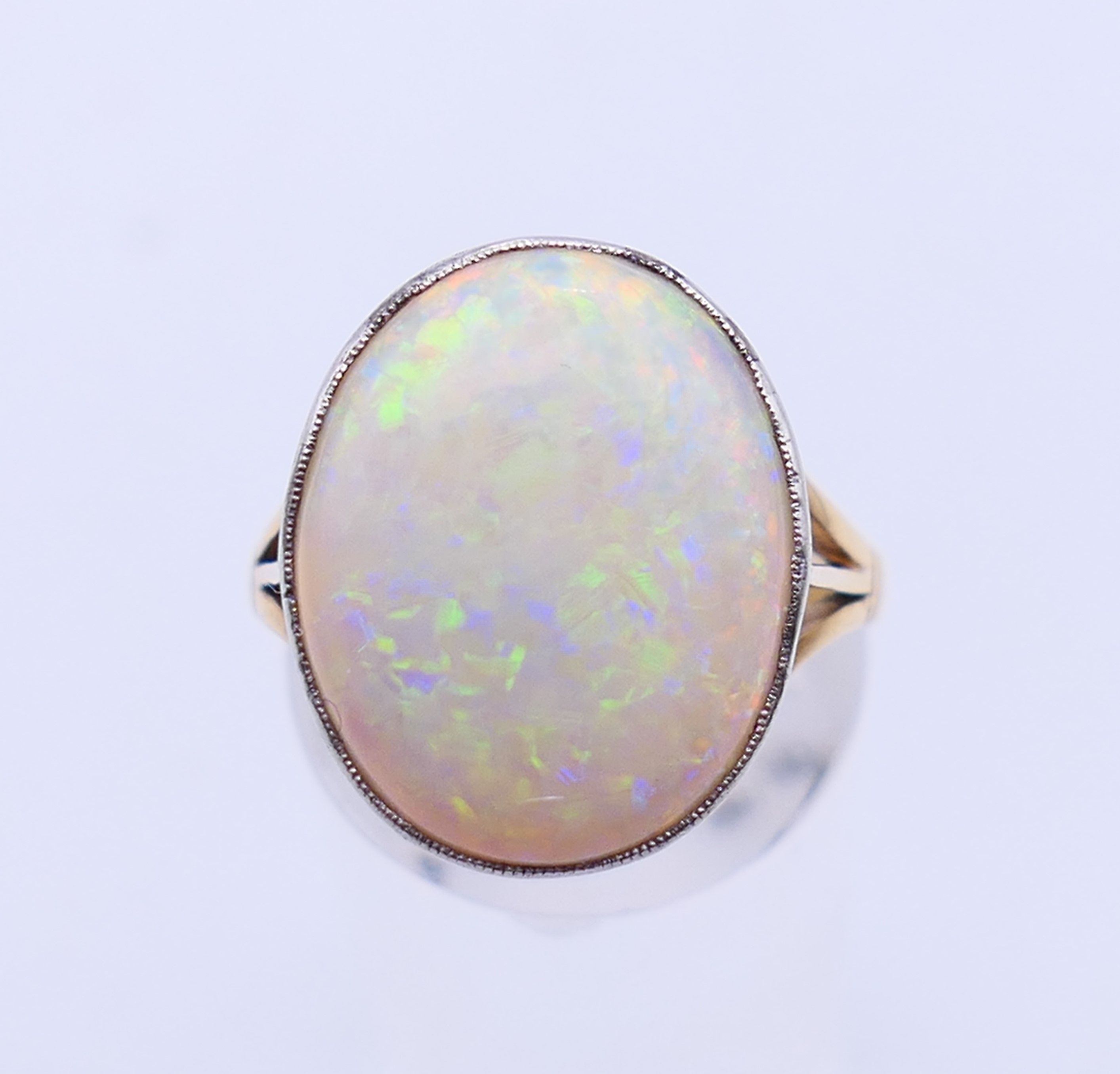 A 15 ct gold and opal ring. Opal 1.8 cm high. Ring size O. - Image 2 of 6