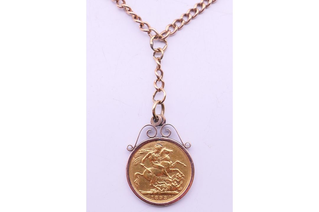 An 1893 sovereign pendant on a 9 ct gold chain. Pendant 2.3 cm diameter, chain 46 cm long. 35. - Image 1 of 6