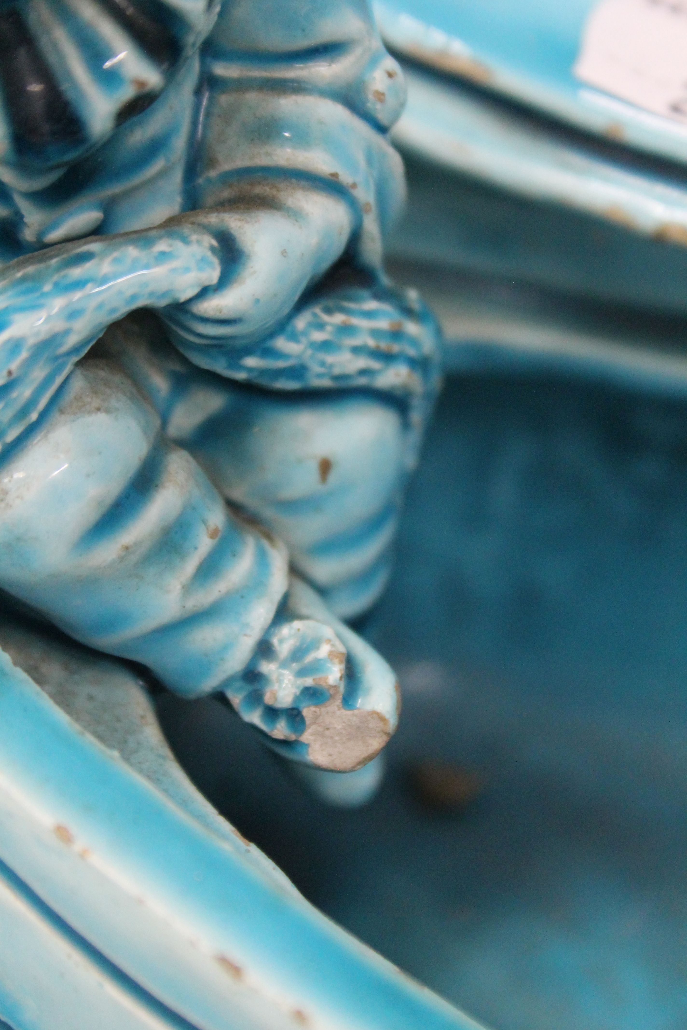 A 19th century blue ground pottery centrepiece formed as clowns in a boat. 31 cm long. - Image 8 of 8