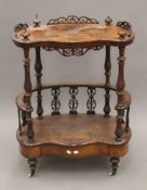 A Victorian burr walnut whatnot. 68 cm wide.